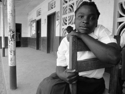 Gloria waits for her turn to sing the anthem for Mr. Demy, an expectedly fun end of year exam.